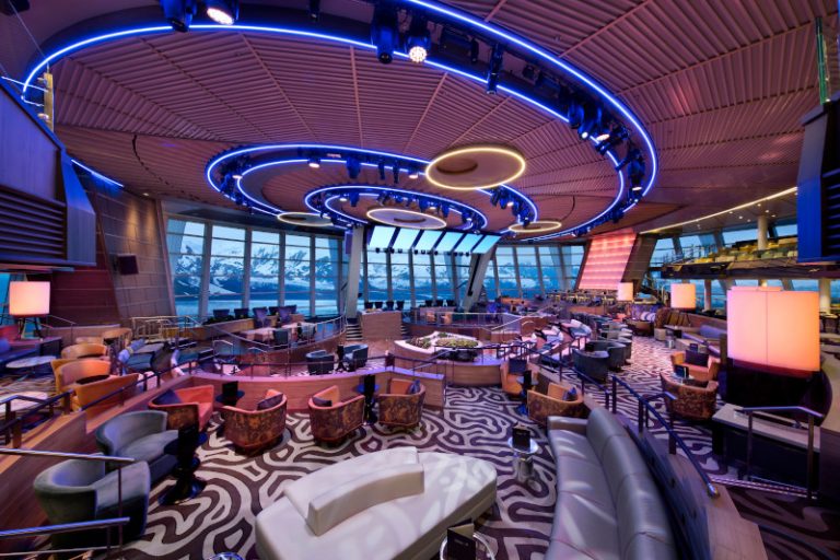 OV, Ovation of the Seas, Two 70 Lounge, bar, entertainment, ocean view, daytime, empty room, view of Alaska mountains and glaciers in windows, (comp image with stock photo from Shutterstock),

NOTE: This is a composite photo made to represent Ovation of the Seas in Alaska. When using this image, please include this disclaimer:
 
"This image is an artistic rendering of Ovation of the Seas. Features vary by ship."