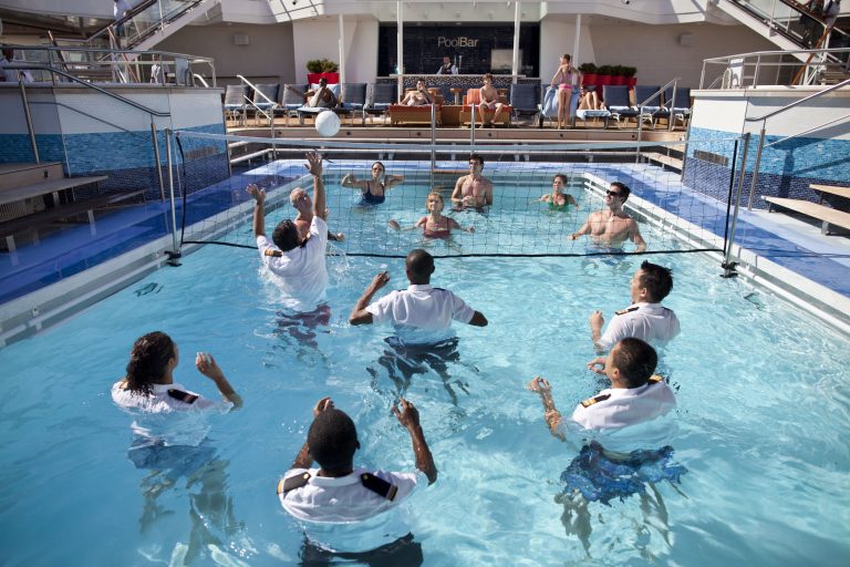 Celebrity Cruises, SI,  Silhouette,  Solstice Class, staff, service, pool activities, volleyball,  guests onboard, relaxation, officer pool volleyball